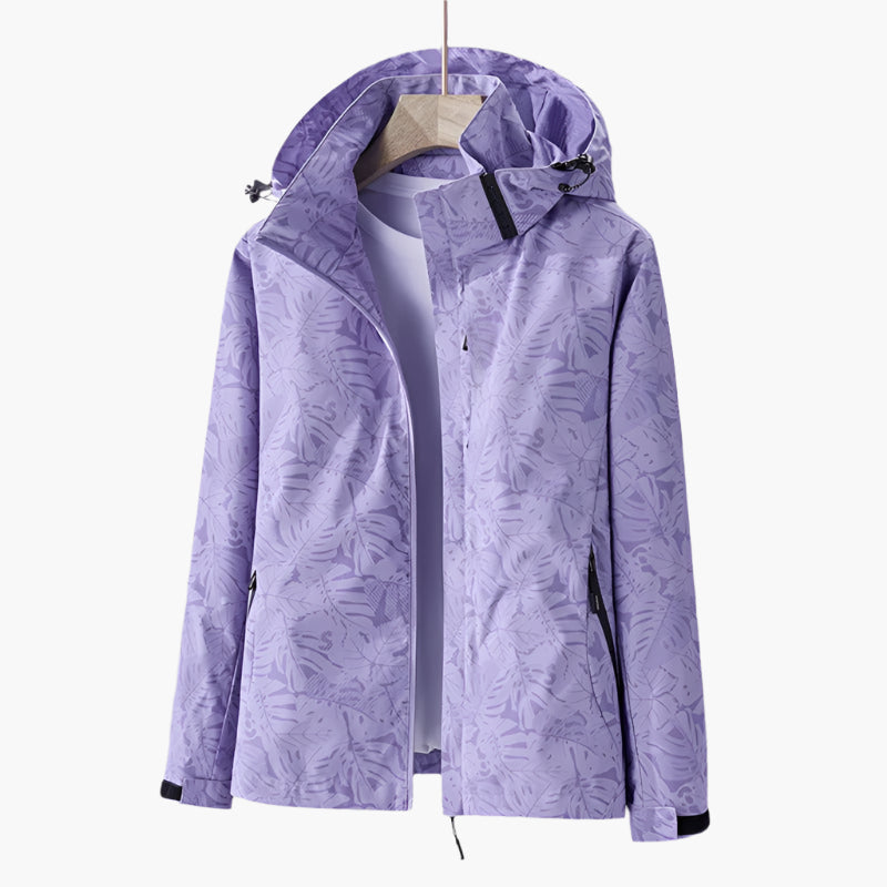 Women's Urban Outdoor Waterproof Windbreaker Jacket – Modern Leaf Print, Hooded, Versatile for City and Adventure