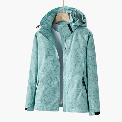 Women's Urban Outdoor Waterproof Windbreaker Jacket – Modern Leaf Print, Hooded, Versatile for City and Adventure